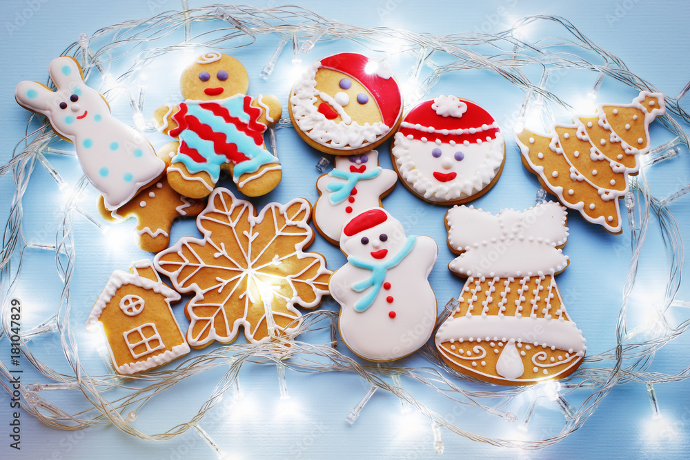 Christmas gingerbread cookies on blue background