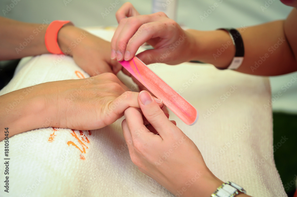 Fototapeta premium woman nail manicure in salon