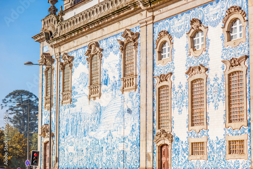 Facade view on the church wall with famous poruguese blue tiles Azulejo in Porto city in Portugal photo