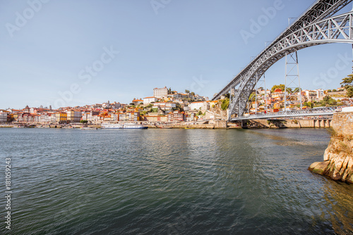 Landscape view on the Douro river with famous Luis Bridge in Porto city, Portugal