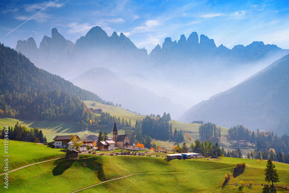 Great morning view of Santa Magdalena village and Santa Maddalena church. Colorful autumn scene of Dolomite Alps, Italy, Europe. Beauty of countryside concept background. Odle Mountains.