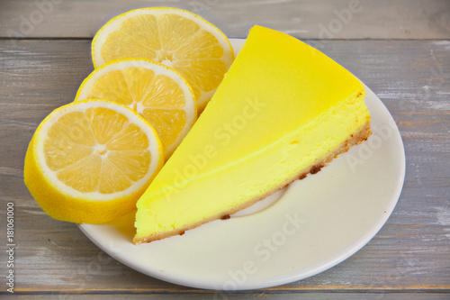 delicious cheesecake with lemon  on  plate