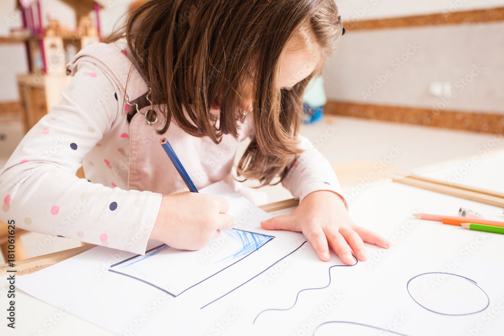 Drawing lesson in kindergarten