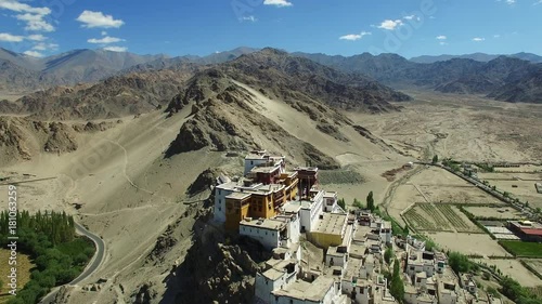 Buddhist Monastery / Aerial view of Buddhist Monastery in a beautiful valley, flying over a Buddhist Monastery. Himalaya, Ladakh, Drone. 