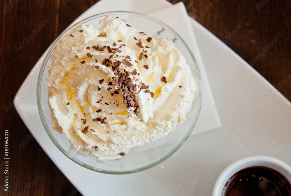 White vanilla cream with cinnamon flake on top White vanilla cream with cinnamon flake on top