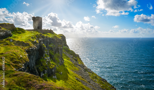A ruines watchtower on the Cliffs of Moher, County Clare, Ireland. photo