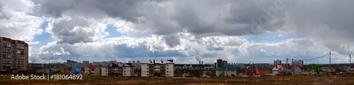 Novovoronezh, Russian Federation, 20 April 2017. Panorama of the city, North district, cottages, cooling towers and church, spring