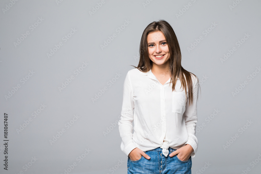 Close up portrait of a woman standing against gray background Close up portrait of a woman standing against gray background