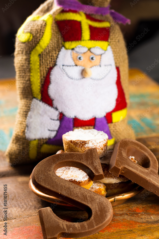 Traditional Dutch Saint Nicolas celebration with presents for children in December, Saint Nicolas  gift bag and chocolate letters