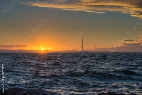 Sailing yacht and sunset in the sea. La Manga. Spain.    