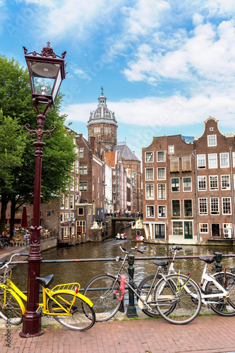 Bicycles on a bridge over the canals of Amsterdam