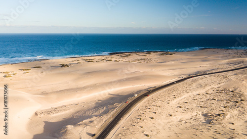 aerial view of road, desert, coast