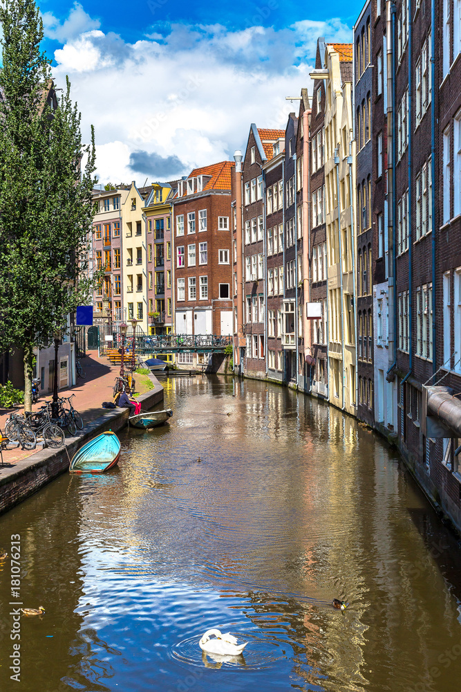 Fototapeta premium Amsterdam canals and boats, Holland, Netherlands.