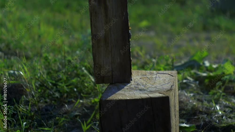 Firewood falls on the stand slow motion Firewood falls on the stand slow motion