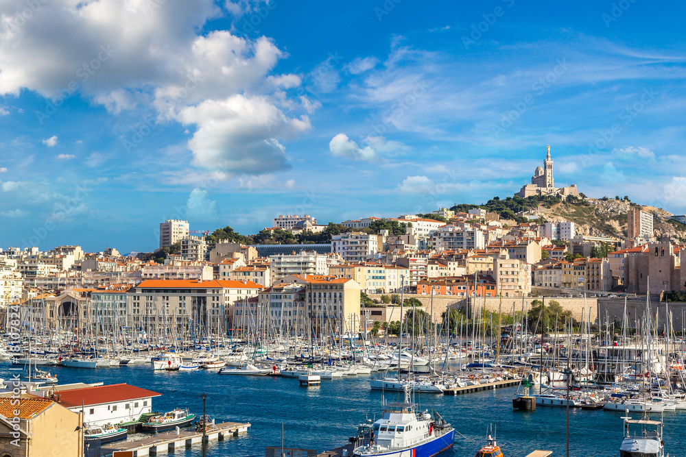 Fototapeta premium Notre Dame de la Garde and olf port in Marseille, France