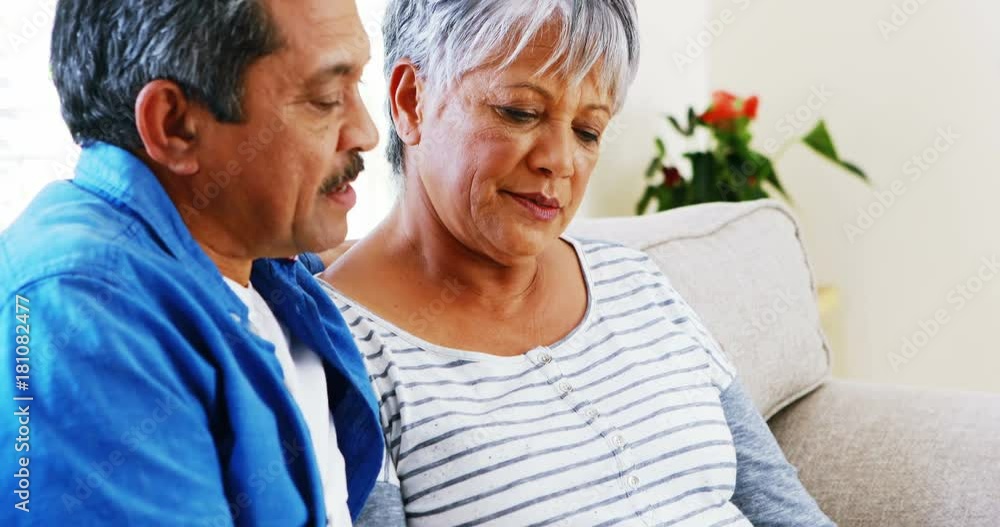 Senior couple doing online shopping on digital tablet Senior couple doing online shopping on digital tablet