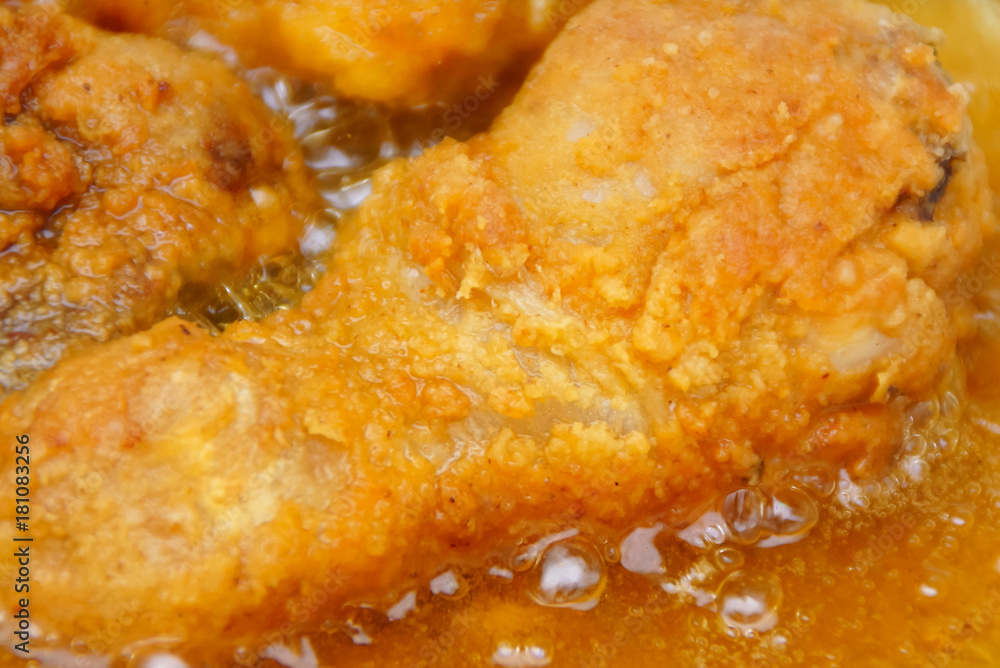 Close Up Chicken Frying In A Pan. Unhealthy Food Concept Close Up Chicken Frying In A Pan. Unhealthy Food Concept