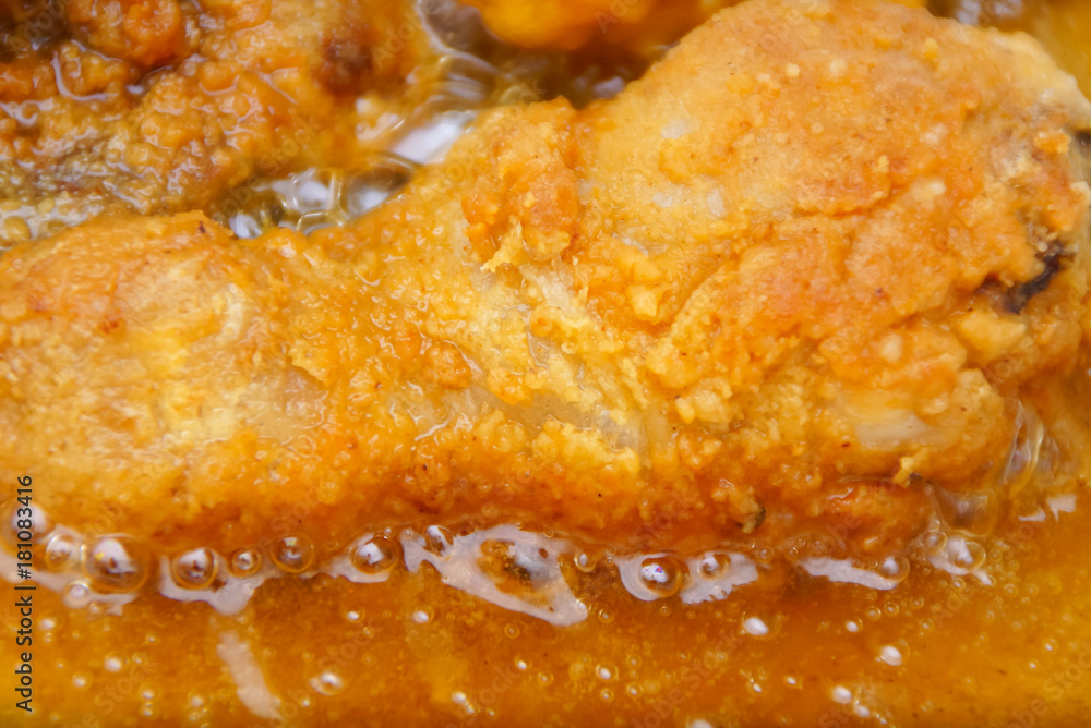 Close Up Chicken Frying In A Pan. Unhealthy Food Concept Close Up Chicken Frying In A Pan. Unhealthy Food Concept