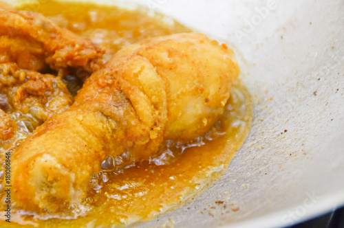 Close Up Chicken Frying In A Pan. Unhealthy Food Concept