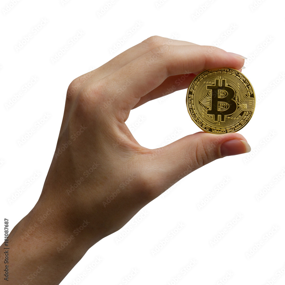Cryptocurrency golden bitcoin coin. Isolated on white. Hand holding symbol of crypto currency - electronic virtual money for web banking and international network payment. Selective focus Cryptocurrency golden bitcoin coin. Isolated on white. Hand holding symbol of crypto currency - electronic virtual money for web banking and international network payment. Selective focus