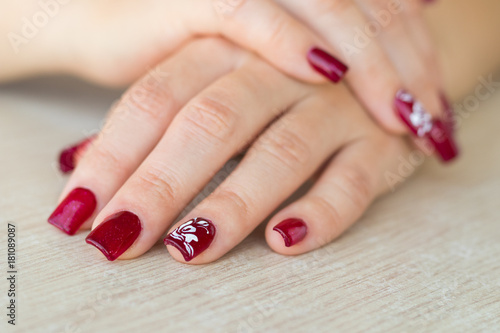 Elegant red manicure for woman