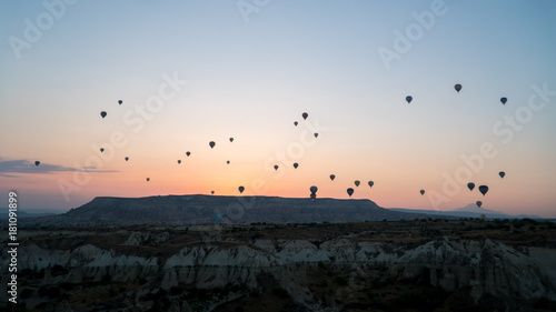 silhouettes of hot air balloons in Cappadocia, Turkey
