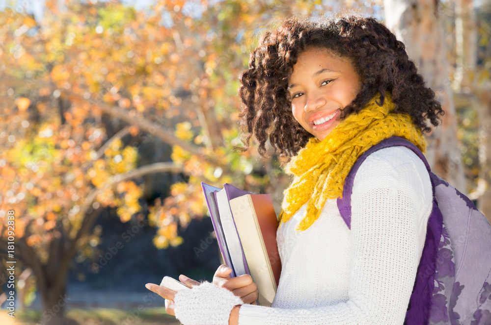 Obraz premium Attractive Black African American Student with Phone