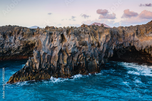 Stunningly beautiful lava caves and cliffs in Los Hervideros after sunset. Lanzarote. Canary Islands. Spain