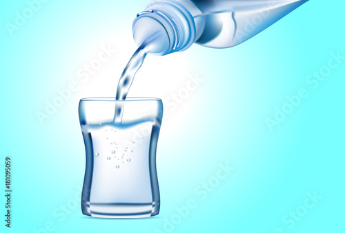 Pouring water from bottle into glass on blue background