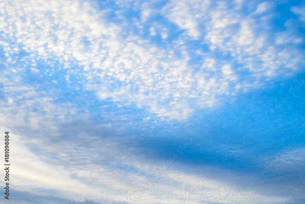 Beautiful blue sky with white fluffy clouds, texture. Nature weather background