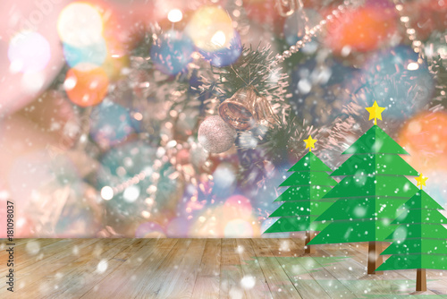 Empty wood table with snowfall and christmas tree - Abstract Christmas background. For holiday and new year concept.