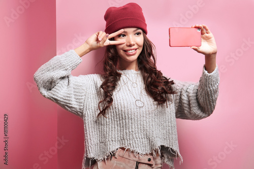 Beautiful hipster girl taki...
