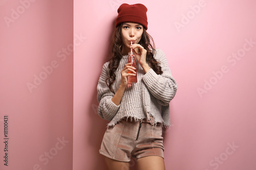 Beautiful hipster girl on p...