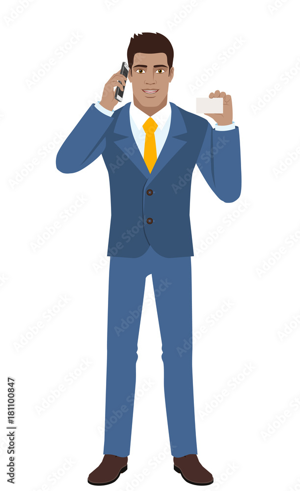 Businessman talking on the mobile phone and showing the business card Businessman talking on the mobile phone and showing the business card