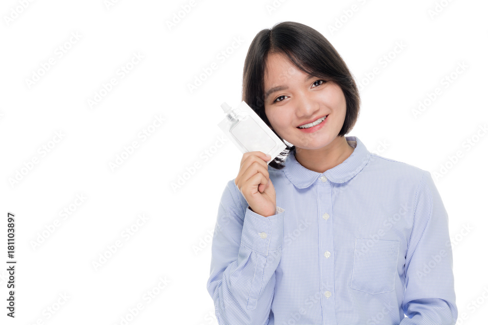 portrait of a beautiful asian businesswoman holding beauty package in her hands. Isolated on white background with copy space portrait of a beautiful asian businesswoman holding beauty package in her hands. Isolated on white background with copy space