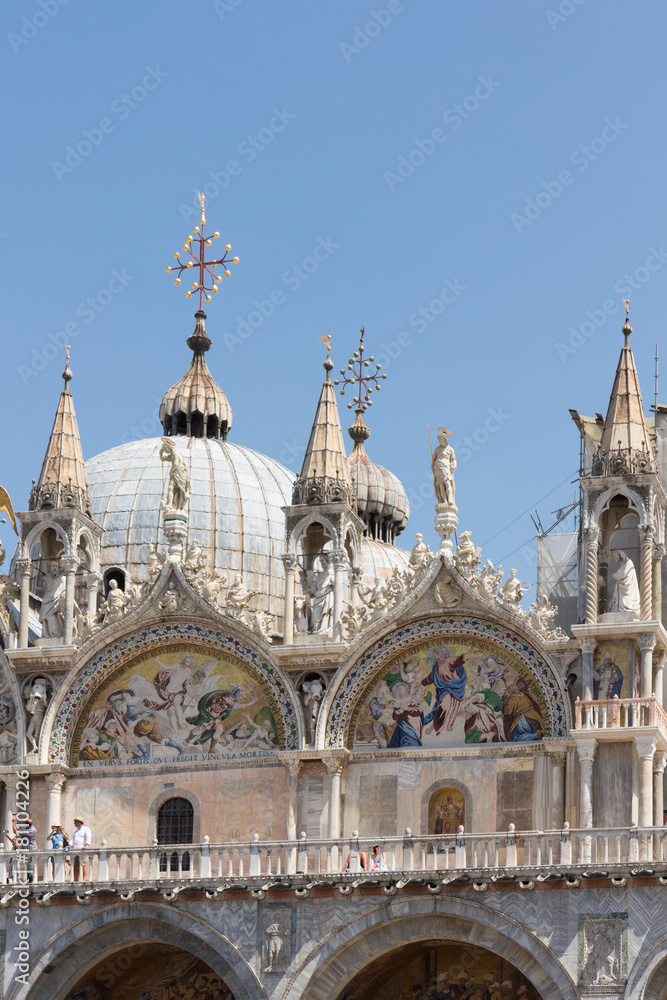 St. Mark's Basilica in Venice. Detail of Byzantine architecture in summer sunlight