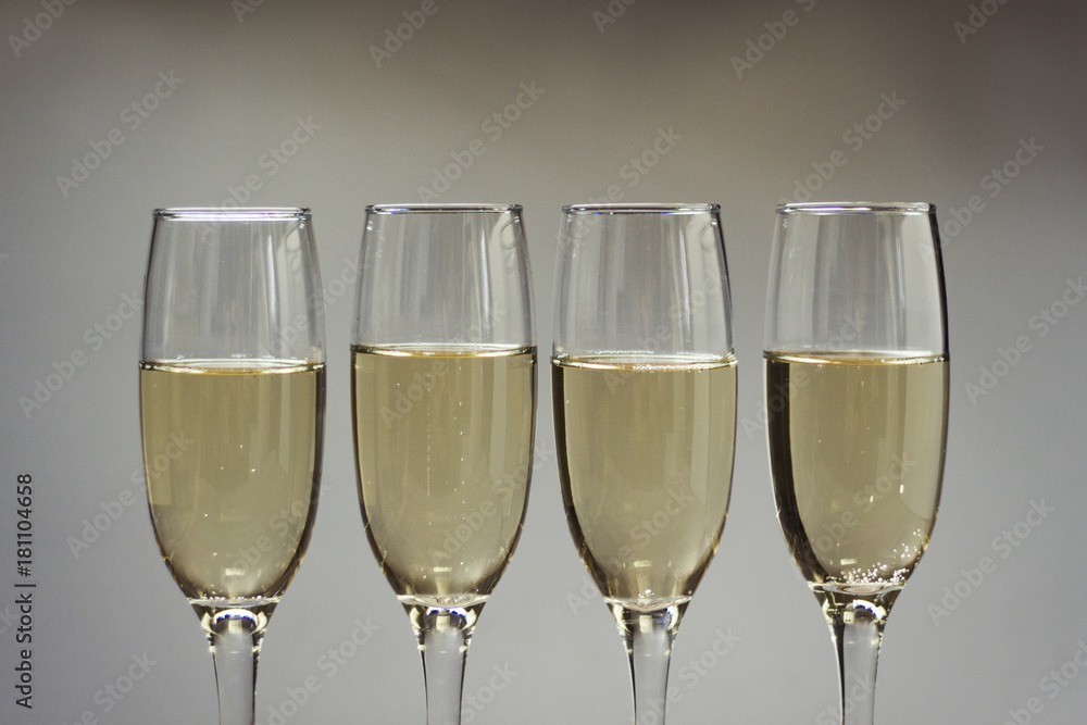 Composition of four glasses with champagne Composition of four glasses with champagne