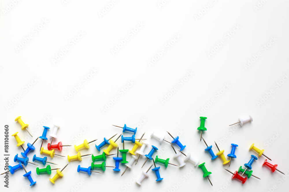 multicolored clerical buttons on a white background multicolored clerical buttons on a white background