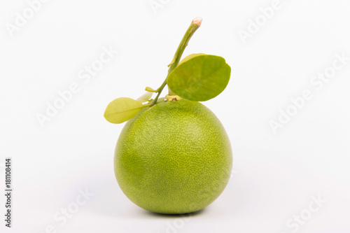 Image of green lime isolated over white background