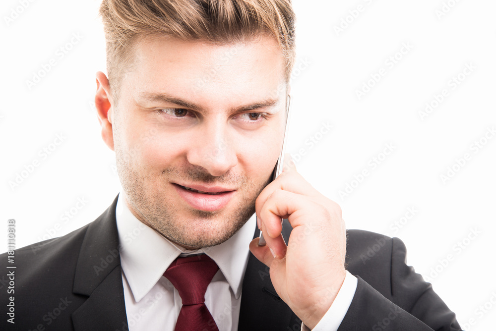 Close-up of business man talking on smartphone Close-up of business man talking on smartphone