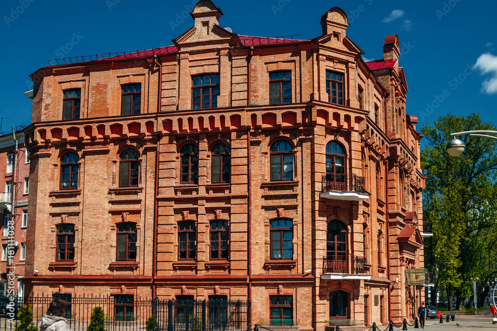 Fototapeta premium Facade of an old red brick building