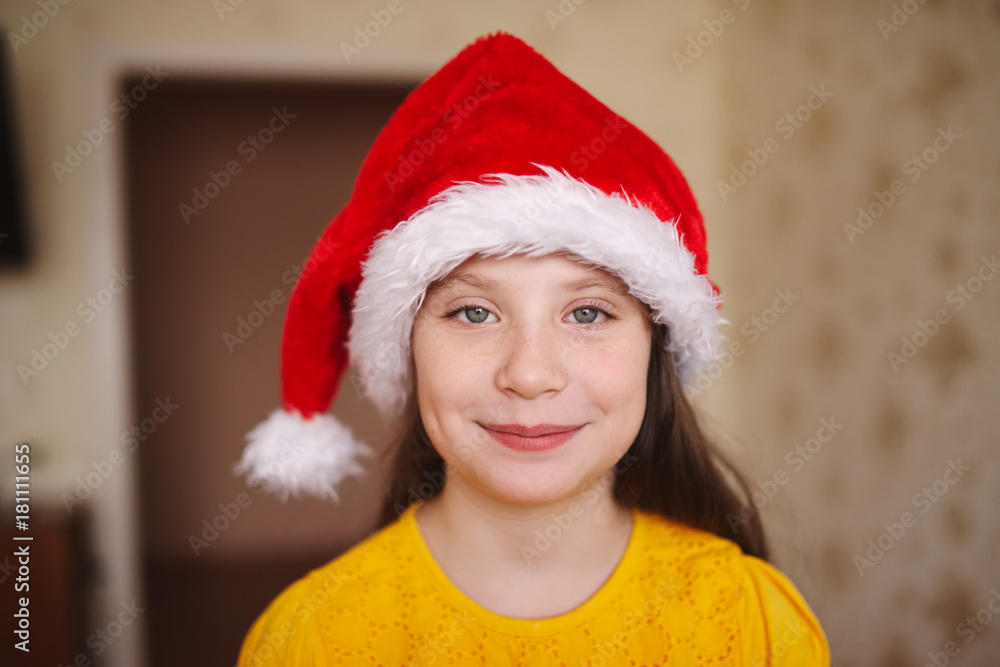 happy little girl with santa hat happy little girl with santa hat
