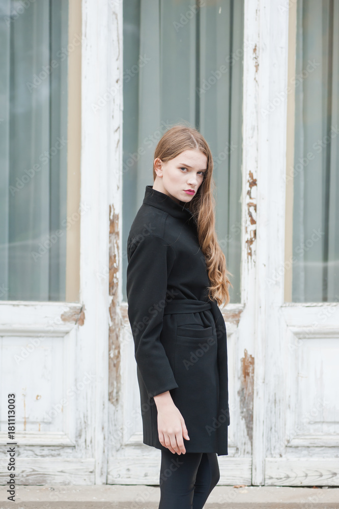Beautiful young woman walking through the streets of Paris Beautiful young woman walking through the streets of Paris