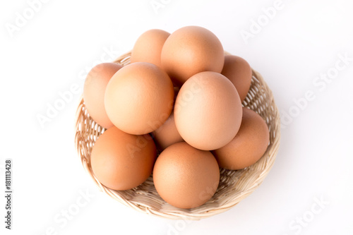 Wallpaper Mural Top view Eggs in the basket on White Background Torontodigital.ca