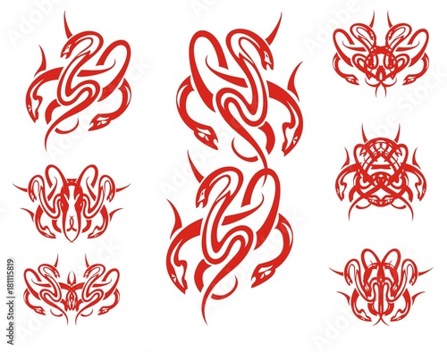  Red snakes symbols in tribal style. A set of the twirled snake symbols isolated on a white background