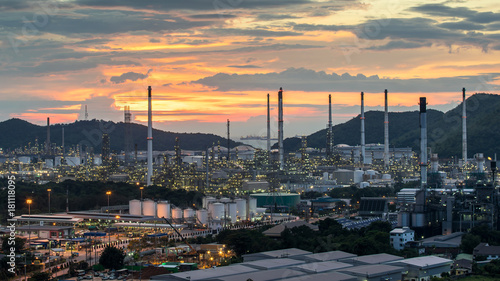 Beautiful sunset petrochemical oil refinery factory plant cityscape of Chonburi province at night , landscape Thailand