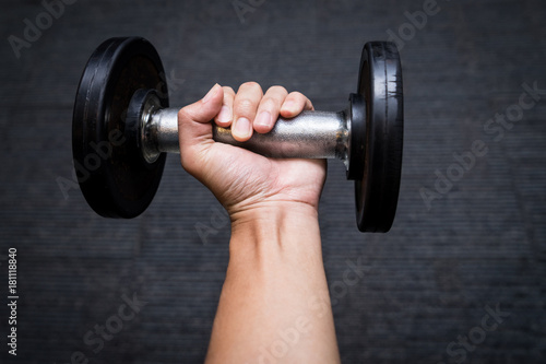 dumbbell on man hand, heavy weight