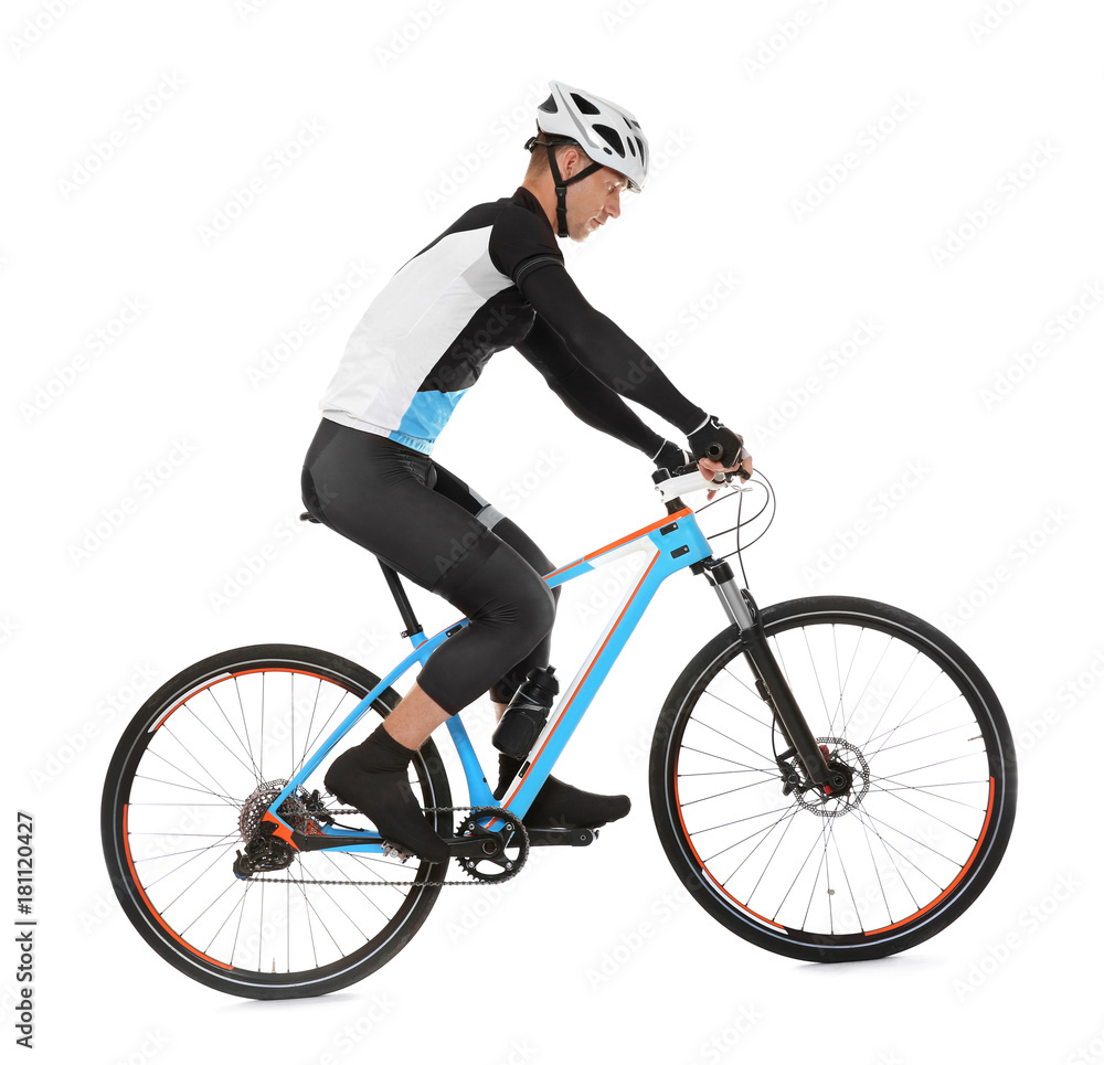 Obraz premium Young sporty cyclist riding bicycle on white background