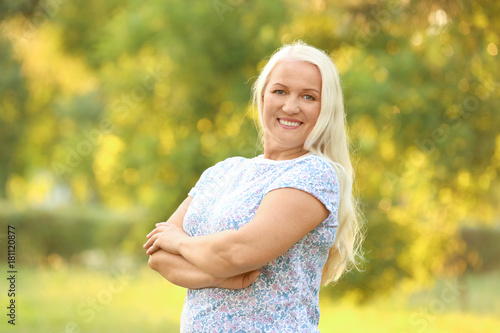 Happy mature woman outdoors