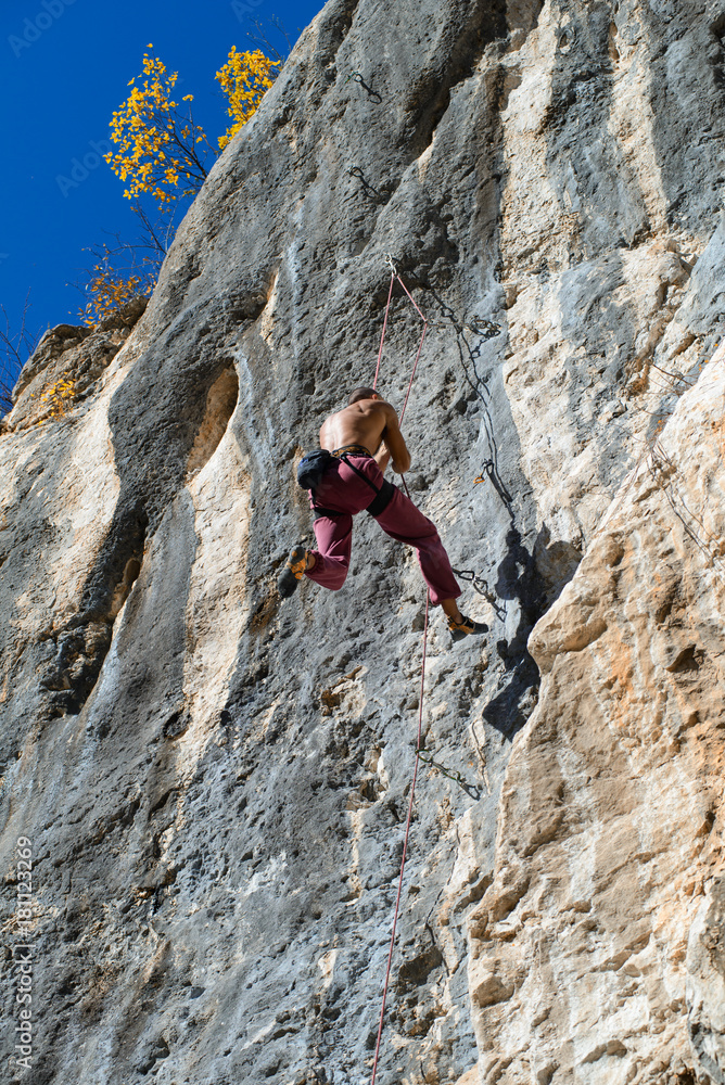 Extreme autumn,rock climbing,on the mountain Extreme autumn,rock climbing,on the mountain